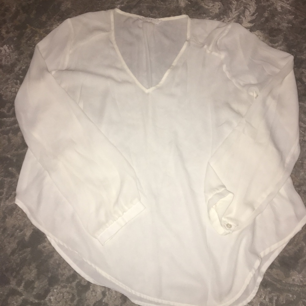 LUSH brand ivory blouse
